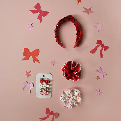 Bandeau en velours à paillettes rouges