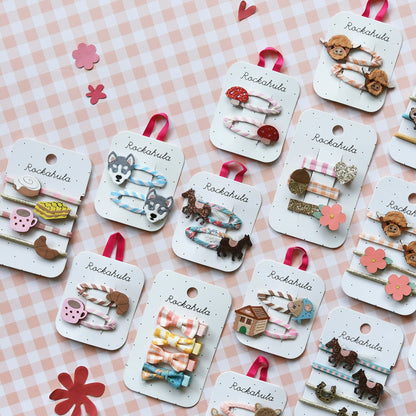 Pinces à cheveux en forme de champignon rayé