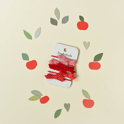 Ensemble de nœud papillon scolaire rouge